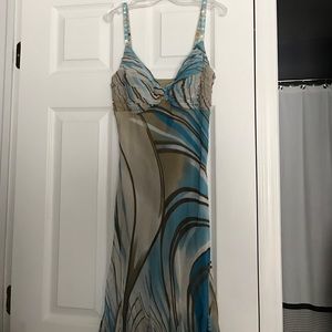 Beautiful fun dress!  Worn one time! Size 4